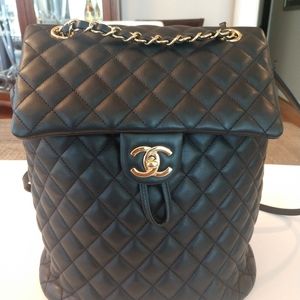 CHANEL Black Quilted Lambskin Backpack with Gold Chain and CC Lock